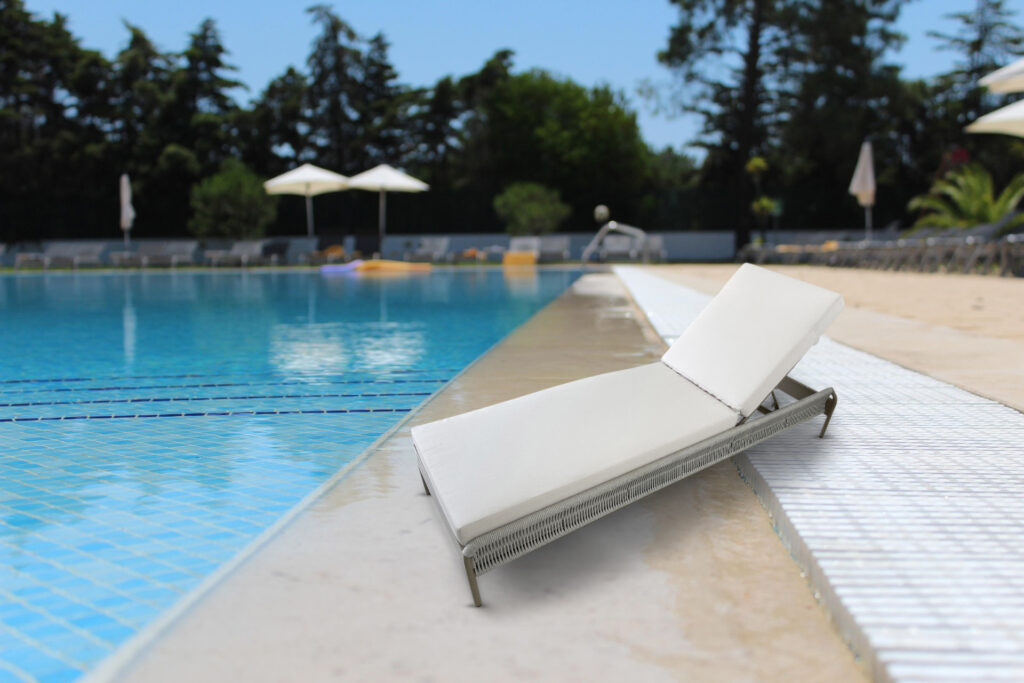 Adriatic Grand wide rope sun lounger with cushion beside a hotel pool showing rope detailing